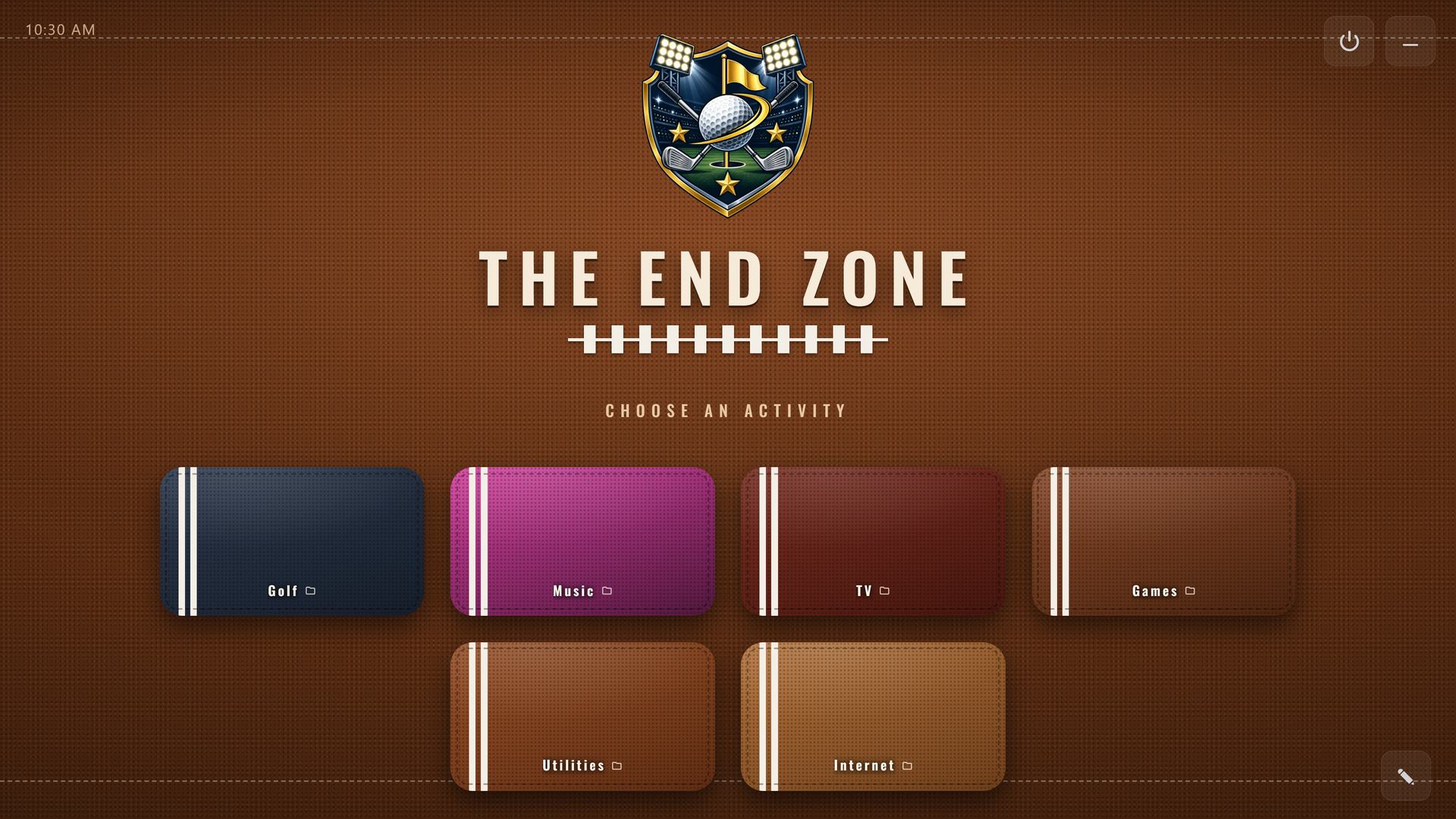 THE END ZONE, a RoomCaddie home screen in the Pigskin theme, with six tiles: Golf, Music, TV, Games, Utilities and Internet.